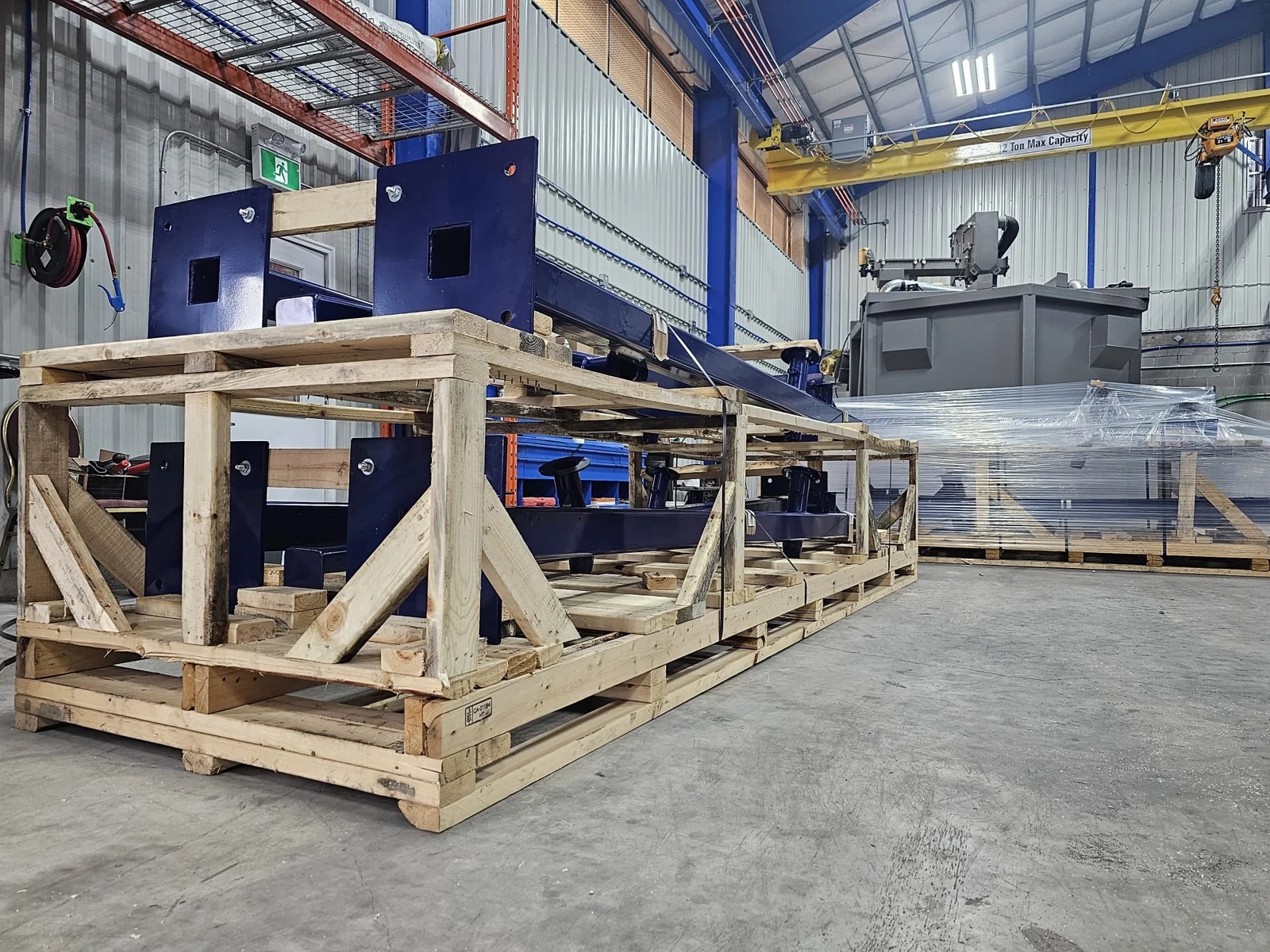 Assemblies secured in wooden shipping frames