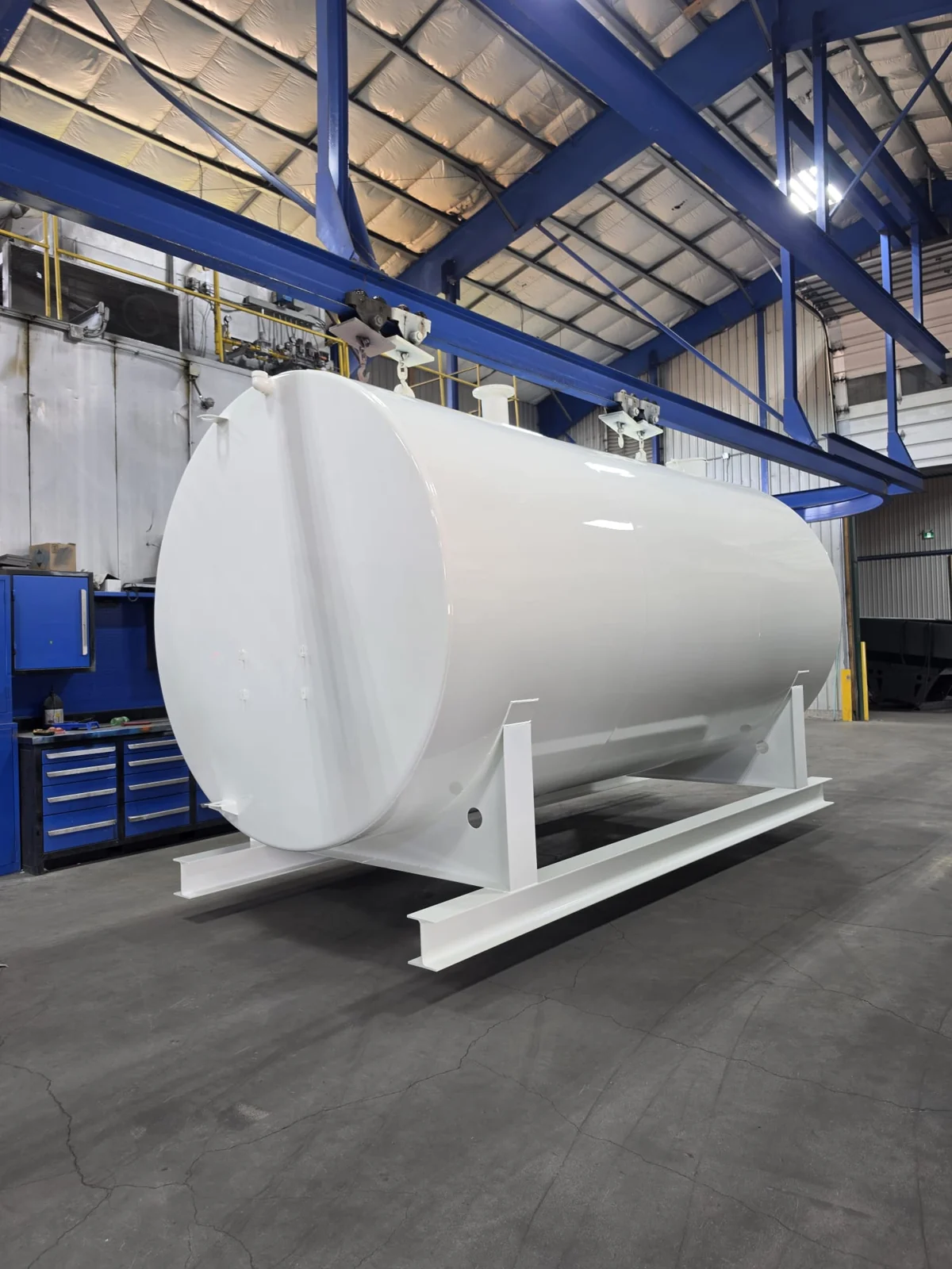 Large white coated tank inside the Mapleside facility
